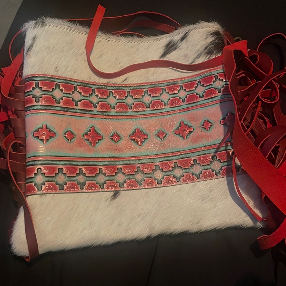 Purchased from TTT leather goods . Never used . I’m not sure of the length .